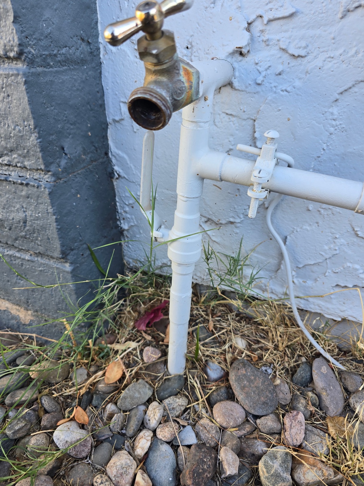 Repaired outdoor hose bib and supply riser on a Phoenix home